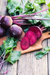 Fresh beet on wooden background