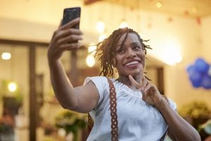 Pretty woman taking selfie